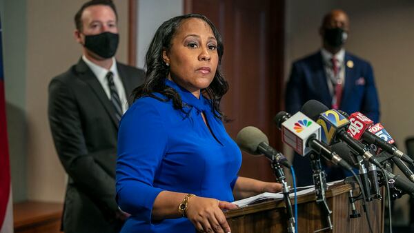 Fulton County District Attorney Fani Willis speaks during a news conference at the Fulton County Courthouse in downtown Atlanta last year. State Sen. Burt Jones spokesman Stephen Lawson, who called Jones' opponent's comments "politically motivated," said Willis — who is investigating former President Donald Trump — hosted a fundraiser last month for that opponent, Charlie Bailey.(Alyssa Pointer/Atlanta Journal-Constitution/TNS)