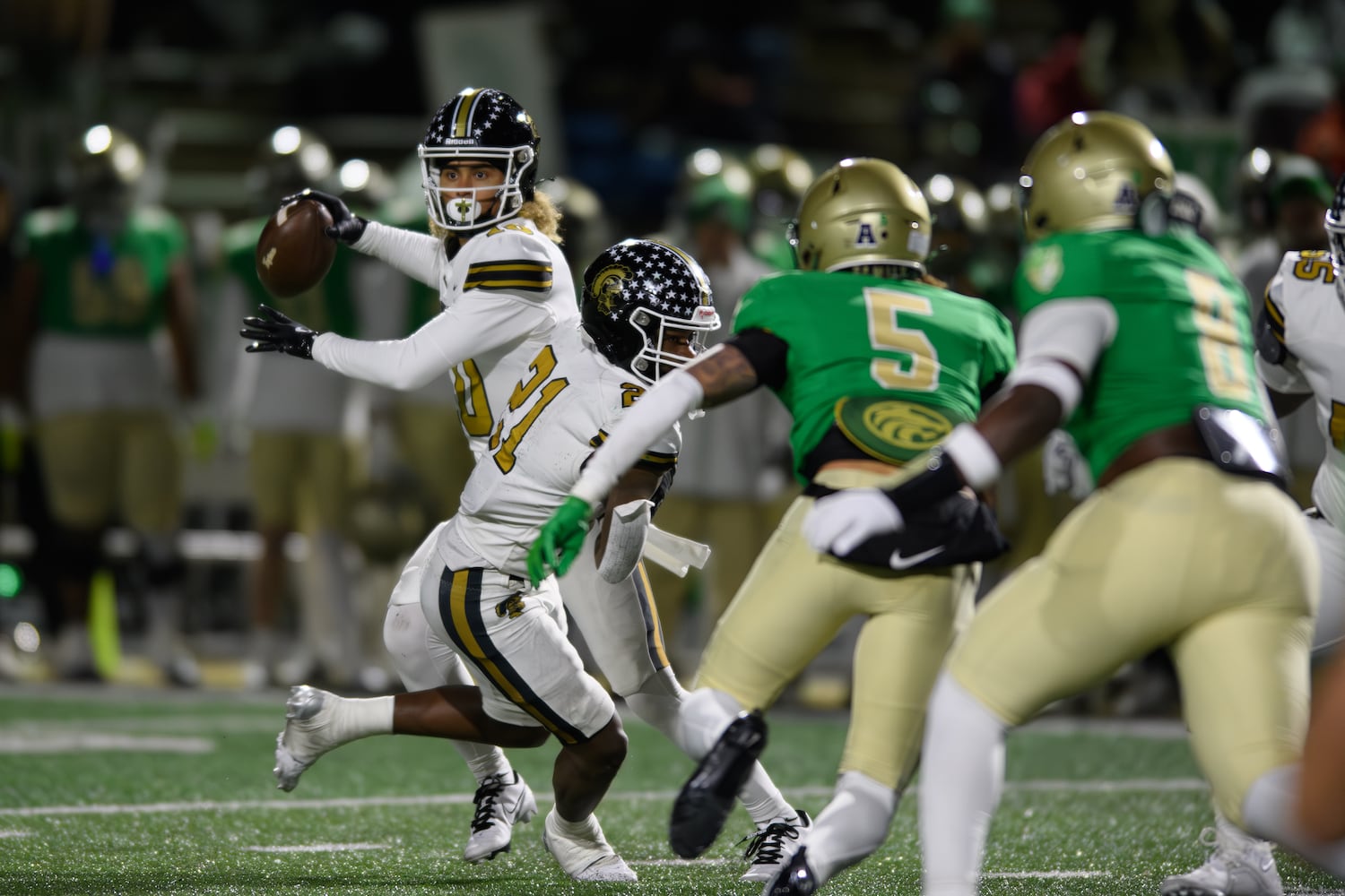 Quarterback Julian Lewis of Carrollton, makes a throw. (Jamie Spaar for the Atlanta Journal Constitution)