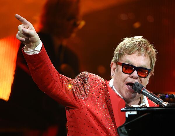 Elton John performs on Dick Clark's New Year's Rockin' Eve with Ryan Seacrest 2015 on December 31, 2014 in New York City. The sometime-Atlantan will play his first full concert in Piedmont Park at Music Midtown. (Photo by Andrew H. Walker/Getty Images for dcp)