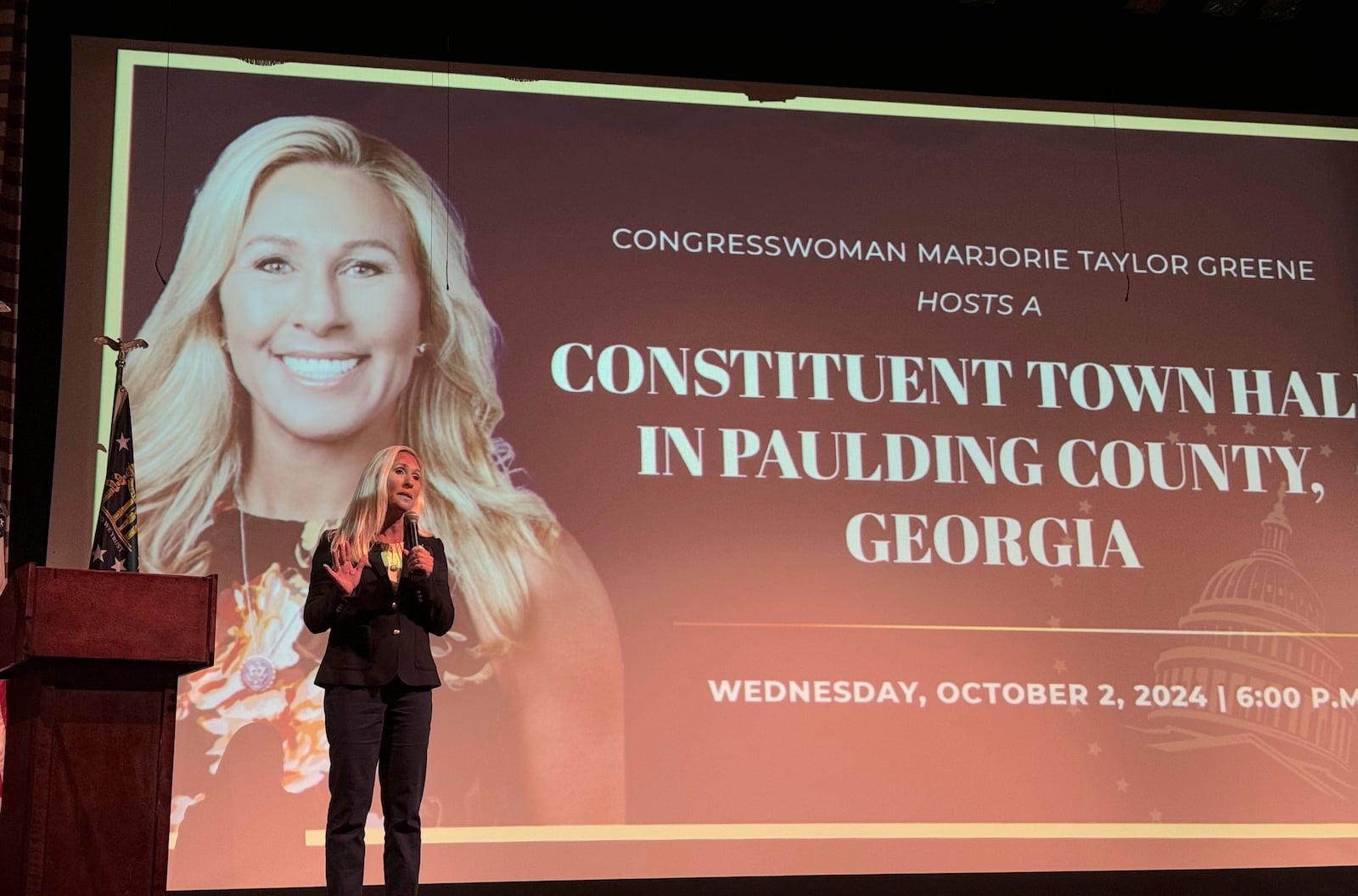 US Rep. Marjorie Taylor Greene speaks to supporters at a town hall in Dallas, Ga. on Oct. 2, 2024. (AP Photo/Charlotte Kramon)