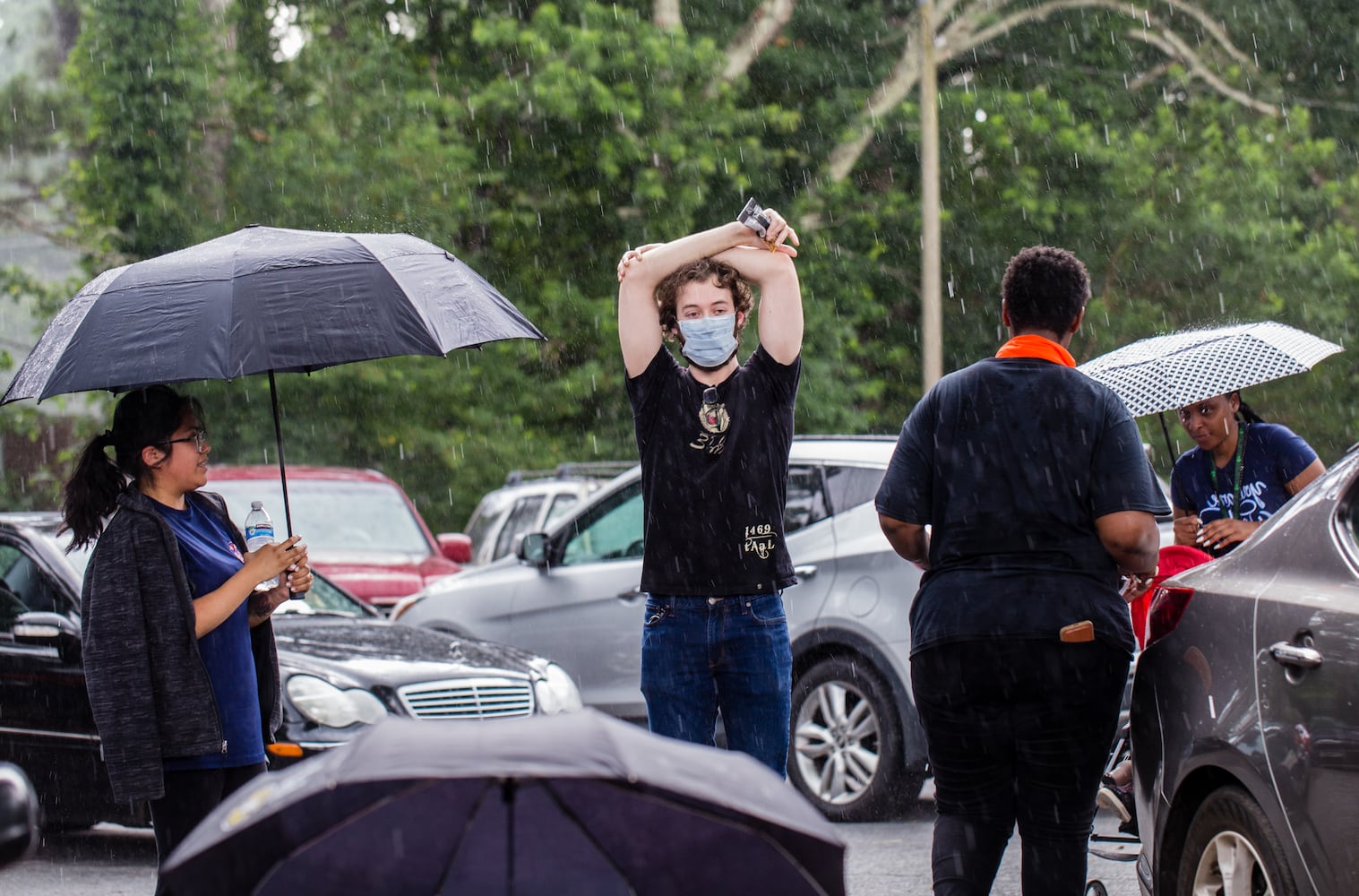 PHOTOS: Georgia voters struggle with long lines, new equipment, social distancing