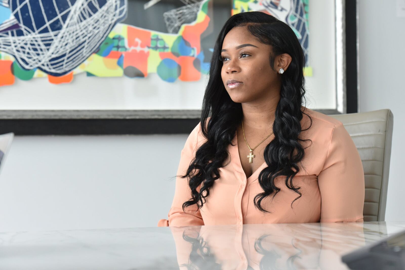 Trafficking survivor Sierra Thompson is now an administrative clerk at the law firm Greenberg Traurig. AJC photo: Hyosub Shin