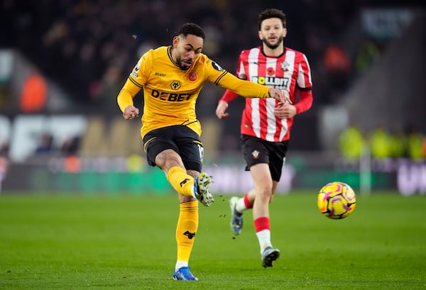 Wolverhampton Wanderers' Matheus Cunha scoring his sides second goal during the British Premier League soccer match between Wolverhampton Wanderers and Southampton, at Molineux, Wolverhampton, England, Saturday Nov. 9, 2024. (Nick Potts/PA via AP)