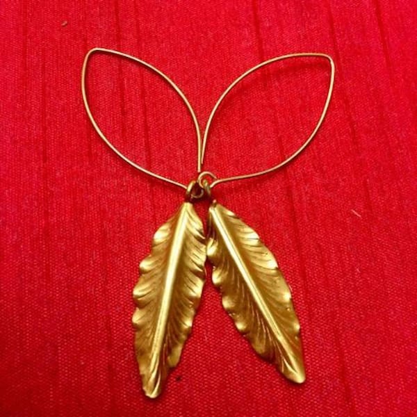 Add modern elegance to her ensemble with fashionable gold-colored leaf earrings by DVOTD. Contributed by Denise McFarlane