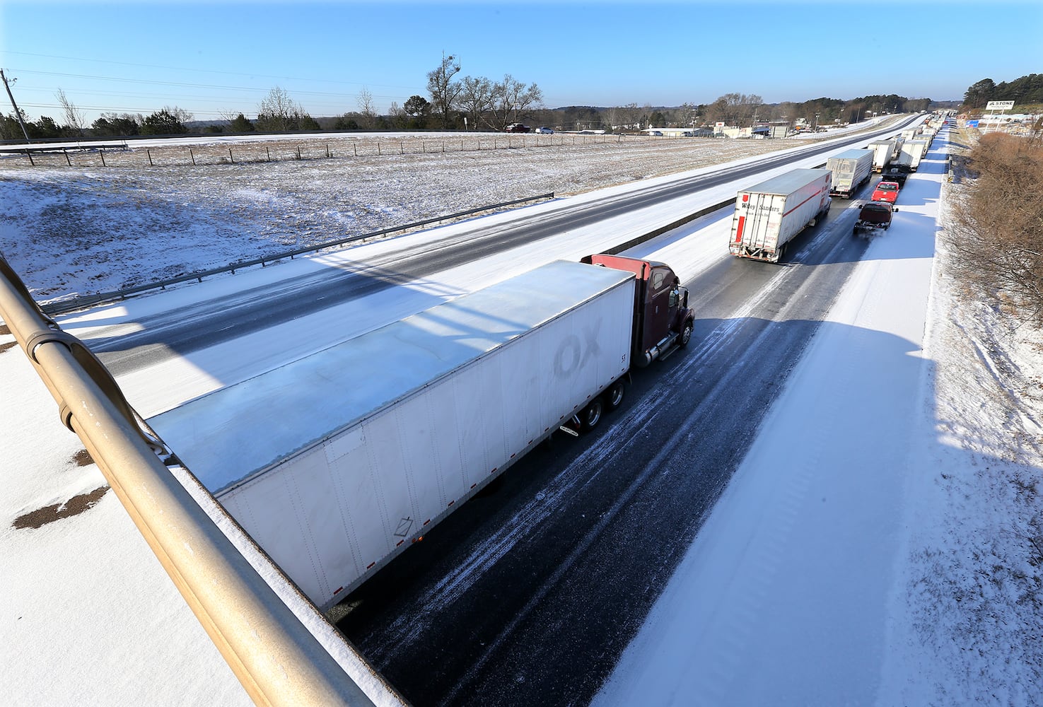 Photos: Frigid cold and snow move in to metro Atlanta