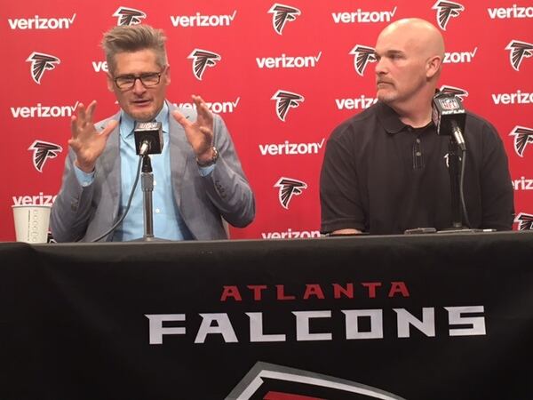 Falcons general manager Thomas Dimitroff and head coach Dan Quinn discussing the draft on Thursday, April 21, 2016. (By D. Orlando Ledbetter/dledbetter@ajc.com)