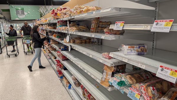 The bread shelves were bare Thursday night at a DeKalb County Publix.