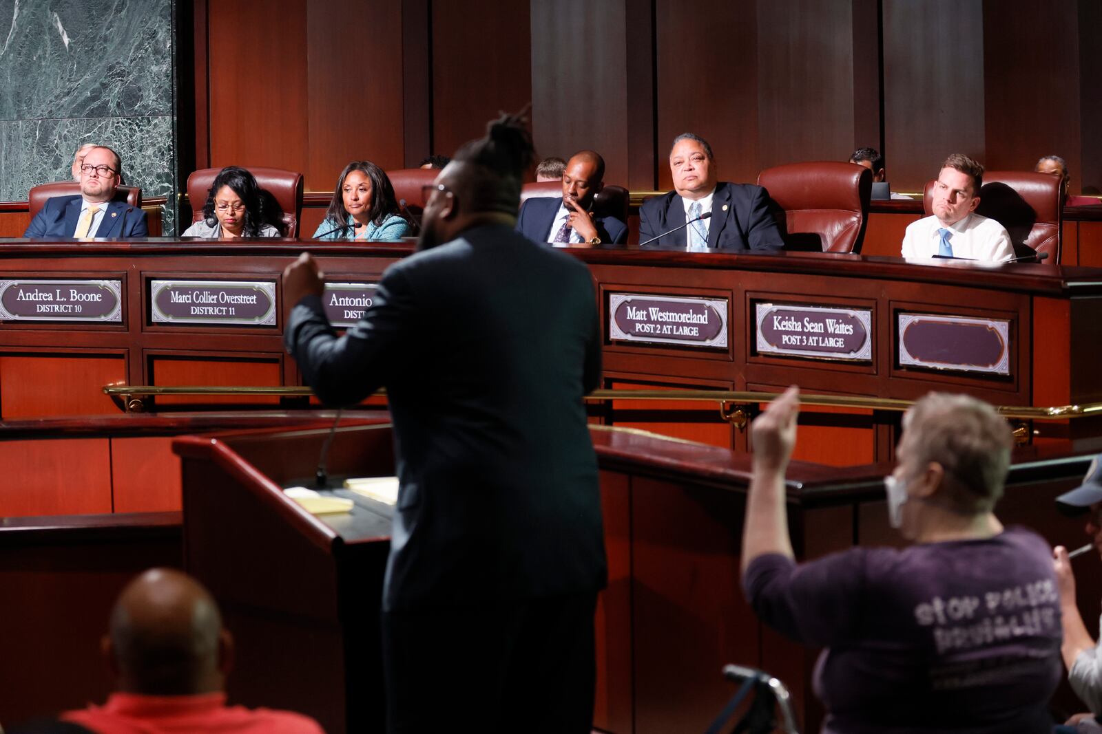 Atlanta City Council members listen to David Franklin from the Southern Center for Human Rights during the public comments sessions before voting 11-4 to approving funding for a public safety training center. (Miguel Martinez/The Atlanta Journal-Constitution)