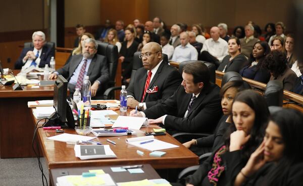 4/17/18 - Atlanta - Chief Assistant District Attorney Clint Rucker (center) and defense and prosecuting attorneys watch Defense attorney Bruce Harvey make final arguments for the defense today during the Tex McIver murder trial at the Fulton County Courthouse. Bob Andres bandres@ajc.com