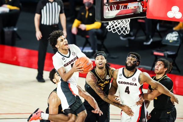 Georgia guard Justin Kier (5) goes up for two of his team-high 16 points in the Bulldogs' 80-70 win over No. 20 Missouri Tuesday night at Stegeman Coliseum. (Tony Walsh/UGA Sports)