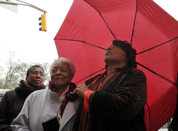 Bernice King and her aunt, Naomi King, A.D. King's widow, watch as a wreath is placed at Ebenezer Baptist Church during a 2013 ceremony. AJC file