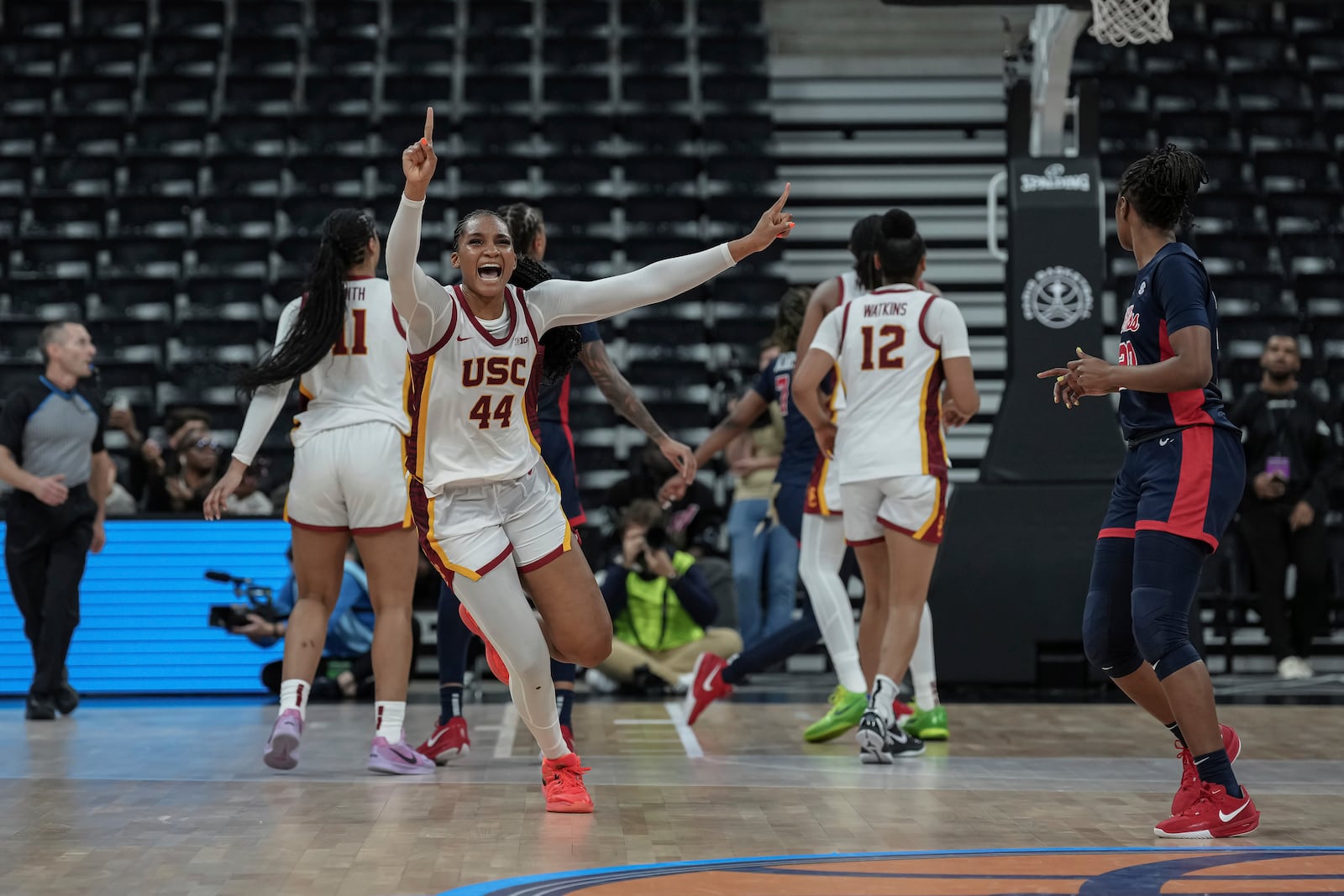 USC Trojans's forward Kiki Iriafen celebrates the victory during the basketball match between the University of Southern California (USC) and Ole Miss, Monday, Nov. 4, 2024 in Paris, France. (AP Photo/Aurelien Morissard)