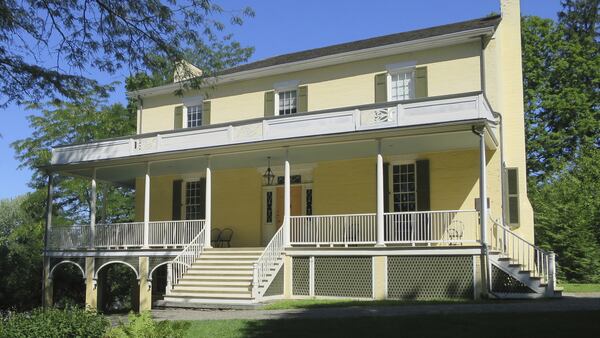 This Aug. 20, 2016 file photo shows Cedar Grove, the home of artist Thomas Cole, considered the founder of the famous genre of American landscape painting known as the Hudson River School, in Catskill, N.Y. Not only did Cole paint the lush mountain landscapes that inspired the Hudson River School art movement of the 19th century, he also painted on the walls of his home. Pretty decorative patterns on the walls in the parlor of his Catskill home had been buried beneath layers of paint for more than a century before they were discovered a few years ago.  (AP Photo/Barbara Woike, File)