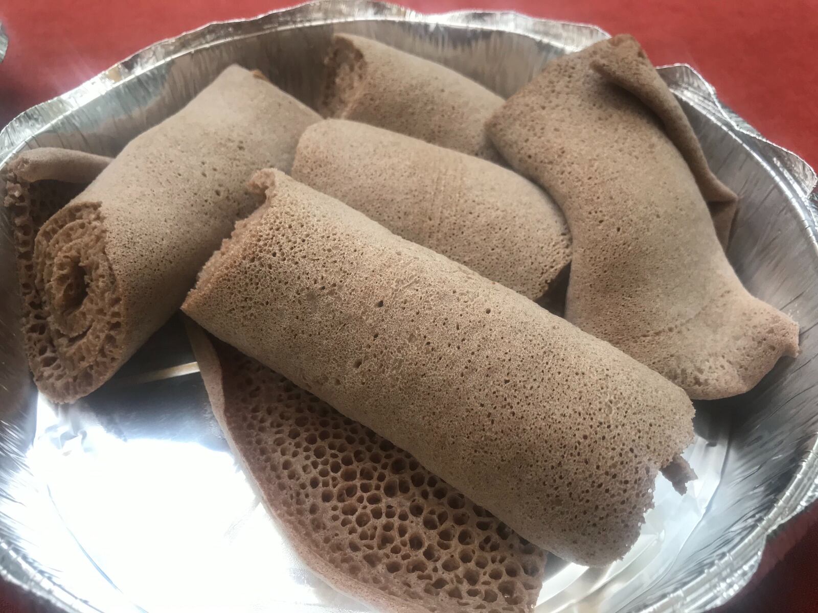 The injera at Kategna is fermented two days and is made entirely from teff flour. LIGAYA FIGUERAS/LIGAYA.FIGUERAS@AJC.COM