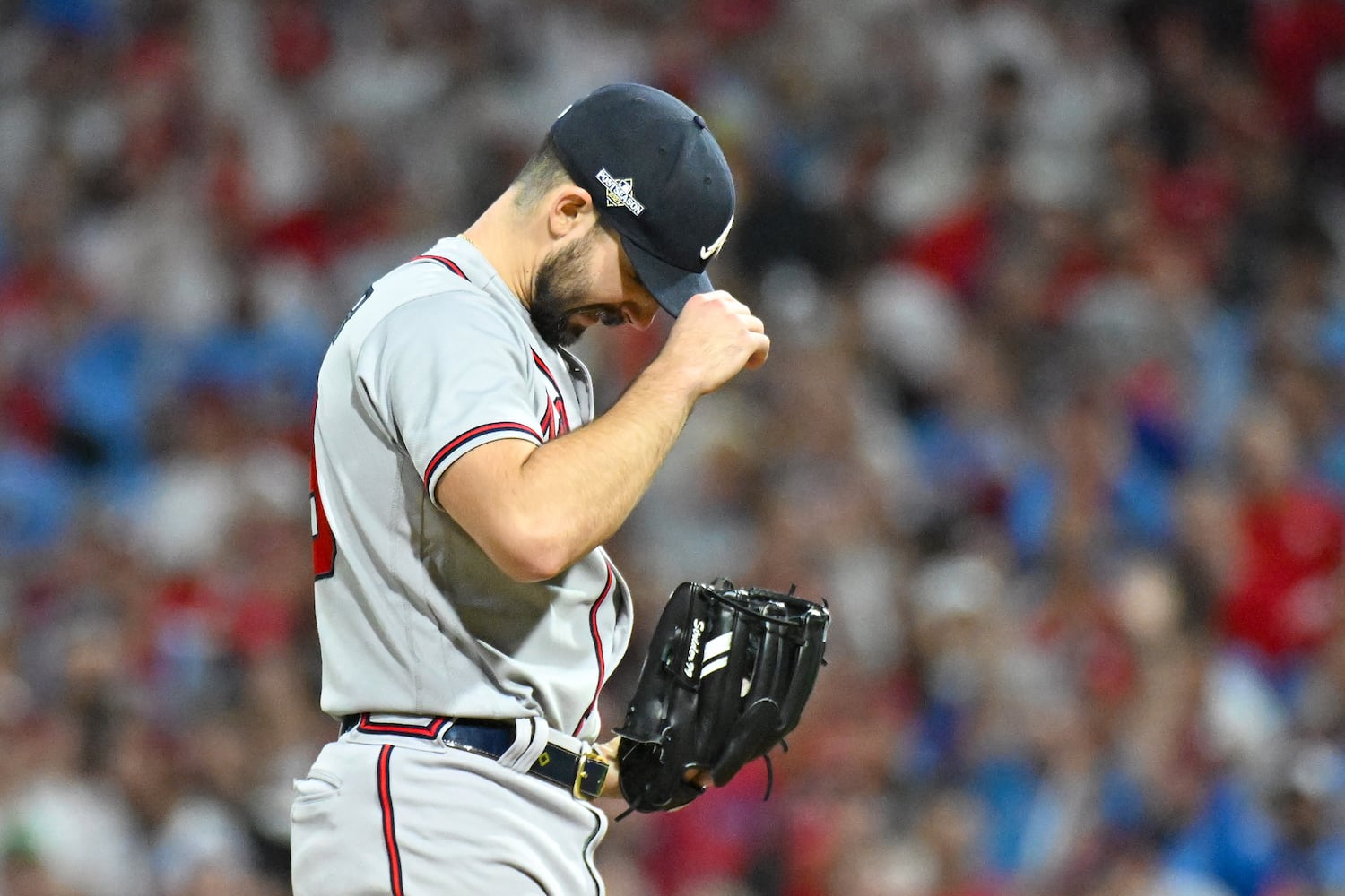 Atlanta Braves starting pitcher Spencer Strider (99) reacts after giving up a solo home run to Philadelphia Phillies’ Trea Turner during the fifth inning of NLDS Game 4 at Citizens Bank Park in Philadelphia on Thursday, Oct. 12, 2023.   (Hyosub Shin / Hyosub.Shin@ajc.com)