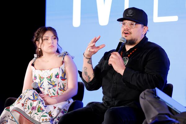 Paulina Alexis and Sterlin Harjo speak onstage at the “Reservation Dogs” screening in Atlanta during SCAD TVfest.