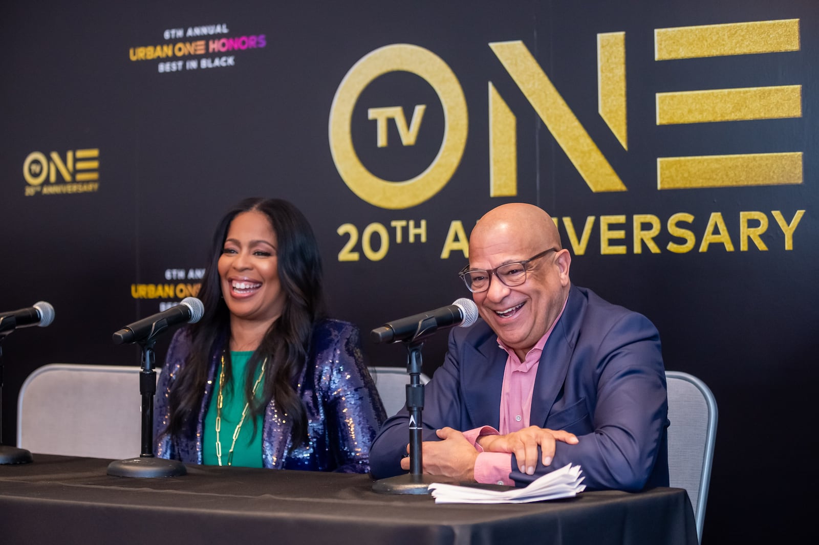 Michelle L. Rice, president of TV One and CLEO TV, and Alfred C. Liggins III, CEO of Urban One and founder, chairman and CEO of TV One, share a laugh at a press conference as TV One announced the 2024 "Urban One Honors, Best In Black." The press conference, which also celebrated the network's 20th anniversary, was at the Waldorf Astoria Atlanta Buckhead on Jan. 19. 
(Bita Honarvar for The Atlanta Journal-Constitution)