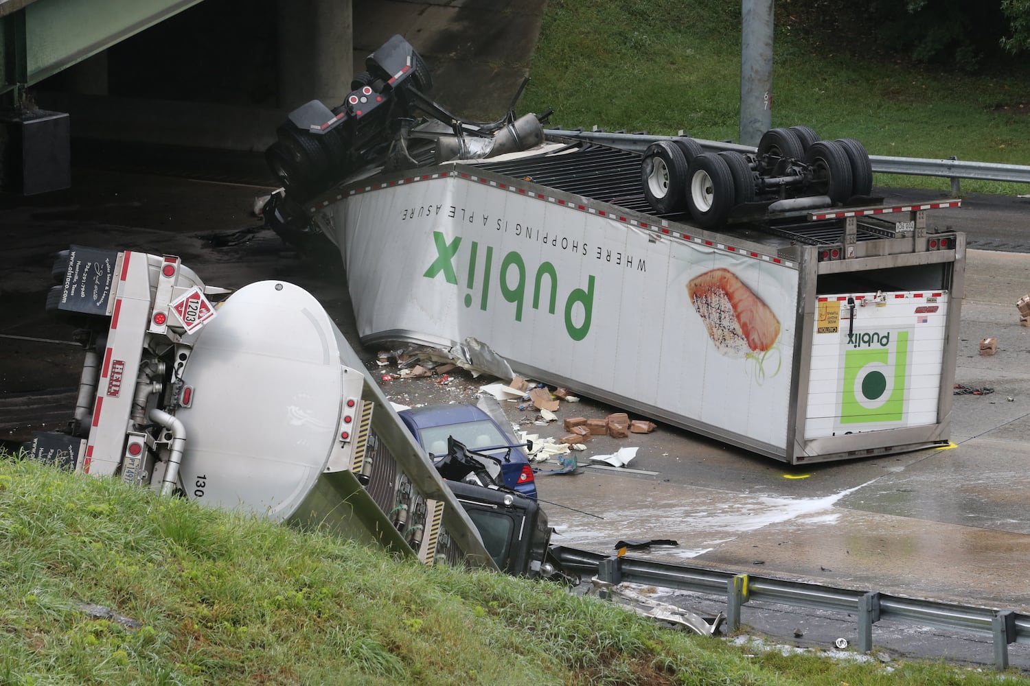 I-285 crash: Trucks plunge off interstate onto Ga. 400