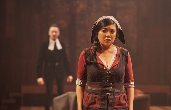 Actor’s Express’ “The Crucible” features Shelli Delgado (with Charles Green in background). CONTRIBUTED BY CHRISTOPHER BARTELSKI