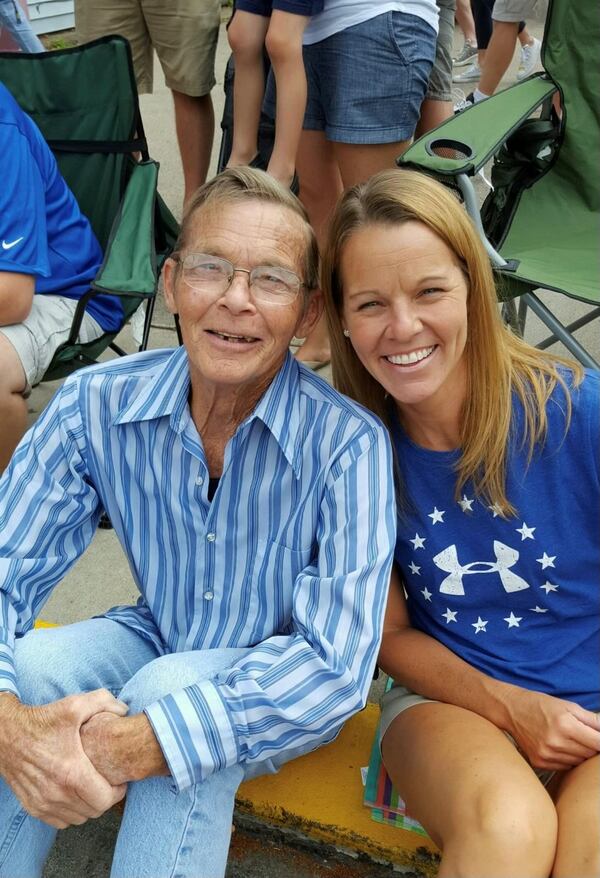 Amy Manville, seen here with her father, Mike Lintz.