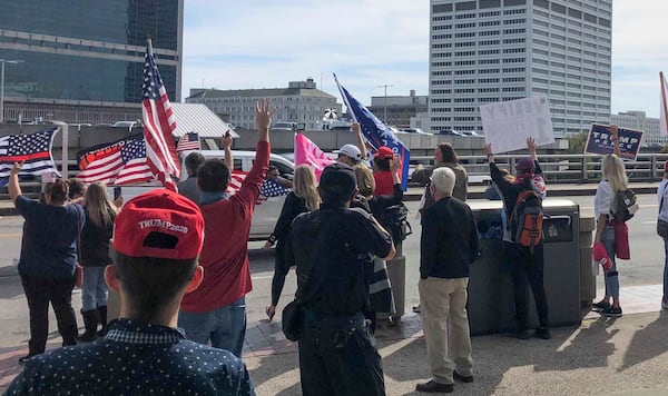 11/5/20 - Atlanta - President Donald Trump supporters line the sidewalk outside of State Farm Arena.   (Alyssa Pointer / Alyssa.Pointer@ajc.com)