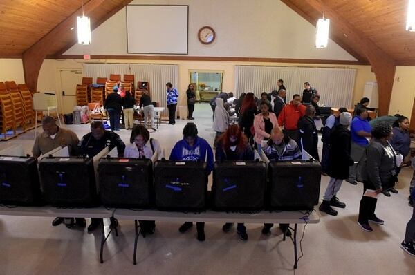 DeKalb County voters go to the polls on Election Day at the Crossroads Presbyterian Church in Stone Mountain, Tuesday November 8, 2016. They join voters across the country in choosing a President, and other elected officials in local and state races. KENT D. JOHNSON / KDJOHNSON@AJC.com