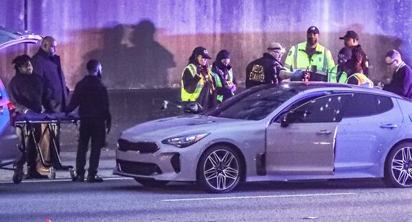 Atlanta police are investigating a deadly shooting Friday morning on the Downtown Connector. Investigators are focusing their efforts on a white sedan riddled with bullets.