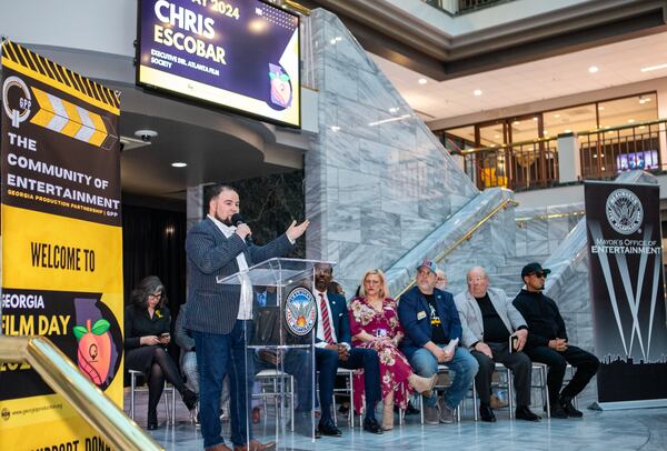 Chris Escobar, executive director of the Atlanta Film Society, address the crowd, including Mayor Dickens, government representatives, Atlanta-based actors, producers and directors during Georgia Film Day 2024 at City Hall on Monday, March 18, 2024.  (Jenni Girtman for The Atlanta Journal-Constitution)