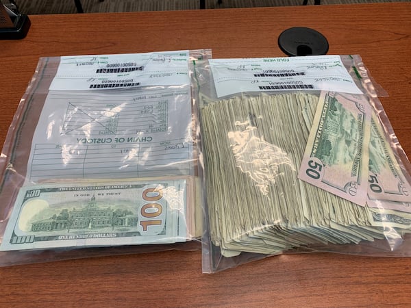 Dunwoody police said two people have already returned about $3,000 total in cash. All denominations of bills spilled from the truck. "Ones, fives, fifties, you name it, it was in there," Sgt. Robert Parsons said.