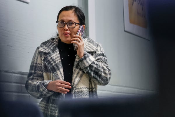 Kenia Velasquez speaks with her husband, Wilson Valesquez, who is in ICE custody in Atlanta on Monday, January 27, 2025. Following their call, Colindres learned that her husband has no right to a hearing before a judge and will be transferred to Stewart Detention Center for deportation.
(Miguel Martinez/ AJC)