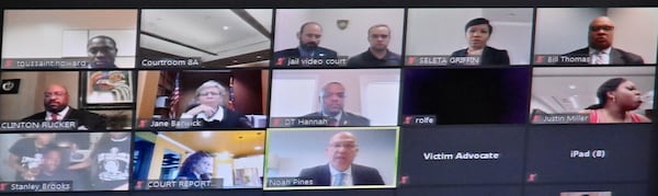 Garrett Rolfe's lawyers, Noah Pines (bottom center) speaks as former Atlanta police officer Garrett Rolfe (top center) listens during a bond hearing for Rolfe via Zoom in Fulton County Superior Court on Tuesday, June 30, 2020. (Hyosub Shin / Hyosub.Shin@ajc.com)