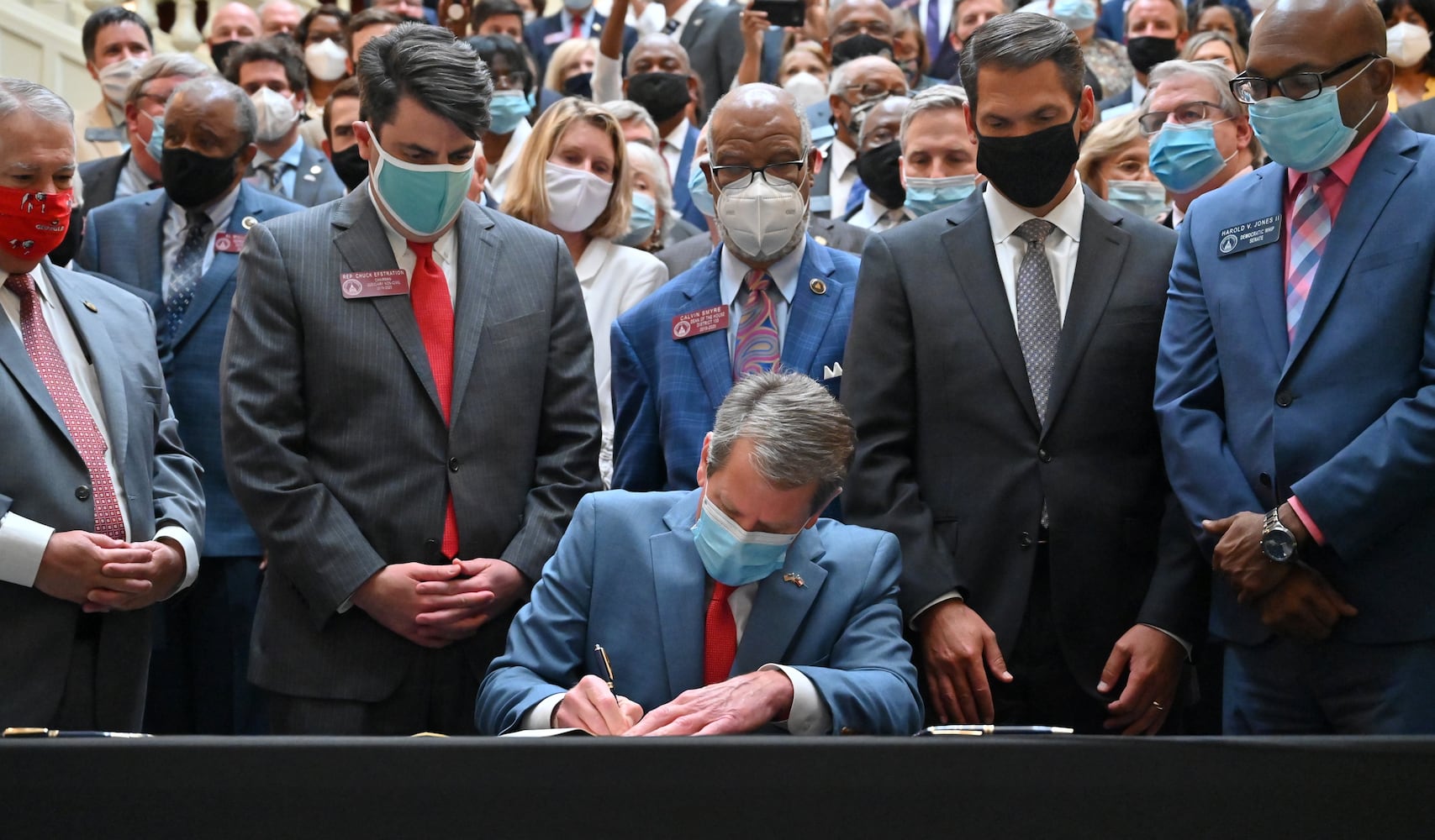 PHOTOS: Gov. Kemp signs hate-crimes bill on last day of legislative session