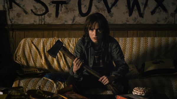 Winona Ryder's character begins grappling with paranormal issues in her home related to her son's disappearance. CREDIT: Netflix