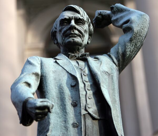 In this AJC file photo, the statue of Tom Watson as it stood at the entrance of the state Capitol. It was moved across the street in 2013.