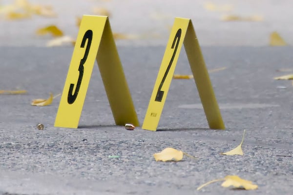 Bullets lie on the sidewalk at the scene outside the Hilton Hotel in midtown Manhattan where Brian Thompson, the CEO of UnitedHealthcare, was fatally shot, Wednesday, Dec. 4, 2024, in New York. (AP Photo/Stefan Jeremiah)