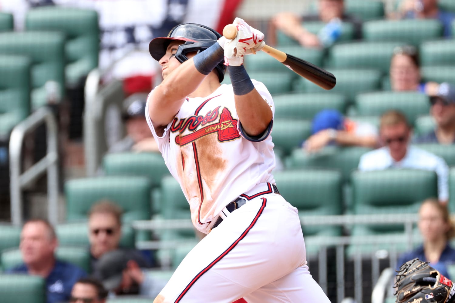 Braves third baseman Austin Riley hits a solo home run in the sixth inning against the Nationals on Wednesday at Truist Park. (Miguel Martinez/miguel.martinezjimenez@ajc.com)