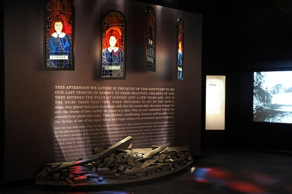 The National Center for Civil and Human Rights in Atlanta features a tribute to the four girls, who are represented in stained-glass portraits. (David Tulis / AJC Special)