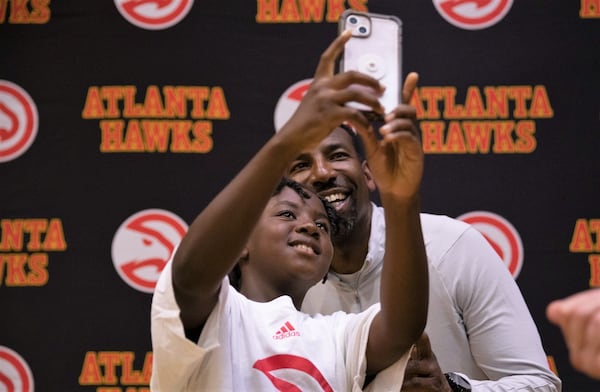 Atlanta Mayor Andre Dickens poses for a selfie