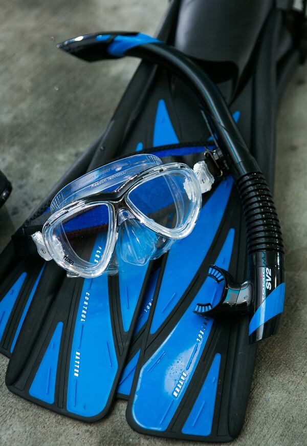 A mask and flippers are shown during Part 2 of the scuba diving class for certification at SeaVentures Scuba and Swim, Saturday, January 30, 2016, in Alpharetta, Ga.