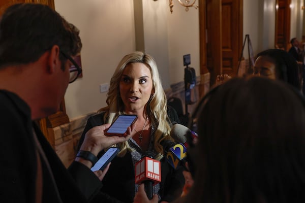 Courtney Kramer speaks to the media after filing paperwork to qualify as a candidate for Fulton County District Attorney at the Georgia State Capitol on Friday, March 8, 2024. (Natrice Miller/ Natrice.miller@ajc.com)