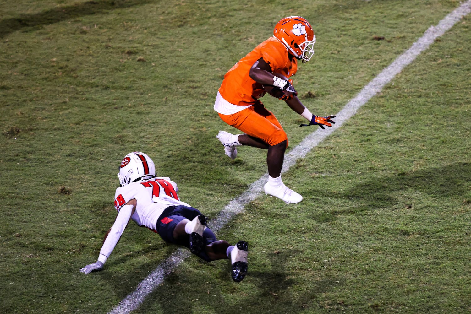 Parkview wide receiver Jordan McCoy (3) hurdles North Gwinnett safety Christian Smith (28) on a run during a GHSA 7A high school football game between the North Gwinnett Bulldogs and the Parkview Panthers at Parkview High School in Lilburn, Ga., on Friday, Sept. 3, 2021. (Casey Sykes for The Atlanta Journal-Constitution)