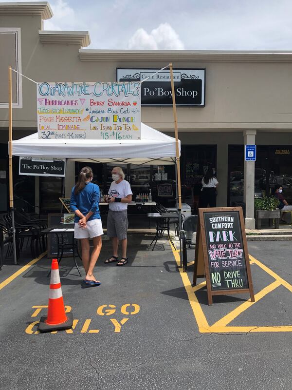 When the pandemic set in, the Po’Boy Shop in Decatur had to close its bar and restaurant, so it put up a takeout tent outside. CONTRIBUTED BY WENDELL BROCK
