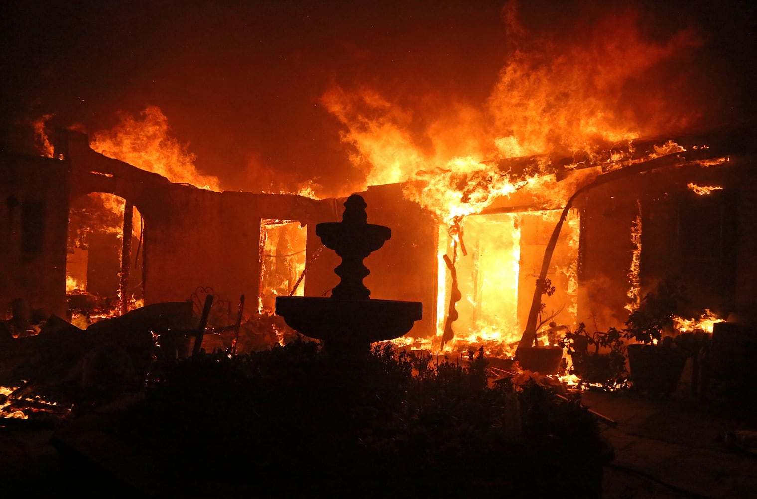 Photos: Deadly wildfires blaze through northern, southern California