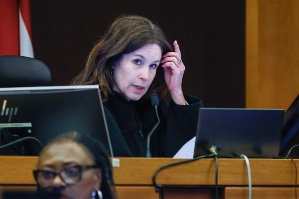 Fulton County Superior Court Judge Paige Reese Whitaker speaks with a prosecutor during the YSL trial at Fulton County Courthouse in Atlanta on Monday, December 2, 2024. The longest trial in Georgia's history ended Tuesday with a verdict.
(Miguel Martinez / AJC)