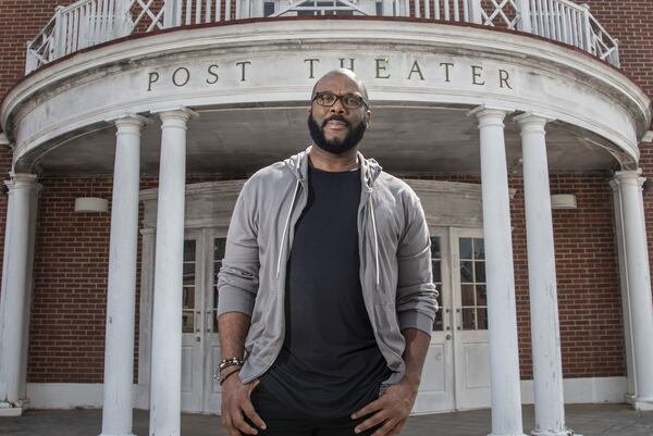 Tyler Perry stands in front of Tyler Perry Studios, the movie production company he built on what used to be Fort McPherson. He bought the land in 2015. HYOSUB SHIN / HYOSUB.SHIN@AJC.COM