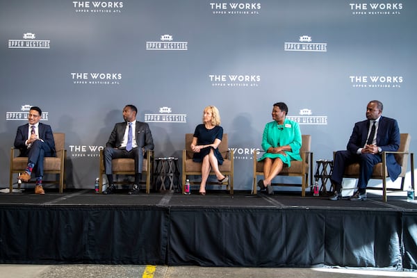 Atlanta mayoral candidates (from left) Antonio Brown, Andre Dickens, Sharon Gay, Felicia Moore and Kasim Reed participate in a candidate forum in July. (Alyssa Pointer/Atlanta Journal Constitution)