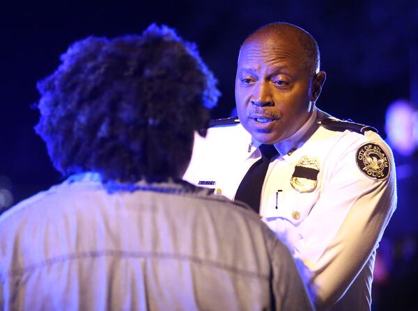 071016 ATLANTA: Chief of Police George Turner speaks with a protester outside the Governor's mansion during a fifth night of demonstrations on Monday, July 11, 2016, in Atlanta. Curtis Compton /ccompton@ajc.com