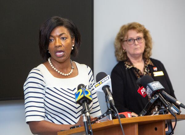 Cobb County Board of Elections Chair Tori Silas, left, and Cobb County Election Management Team Director Janine Eveler, right, held a news conference Monday, Nov 7, 2022, to address the issue of absentee ballots that were requested but never mailed. (Jenni Girtman for The Atlanta Journal-Constitution)
