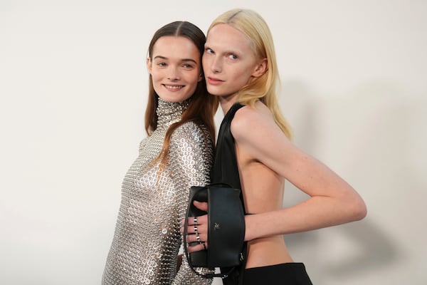 Models wear backstage creations as part of Courreges Fall/Winter 2025-2026 Womenswear collection presented Wednesday, March 5, 2025. in Paris. (Photo by Scott A Garfitt/Invision/AP)