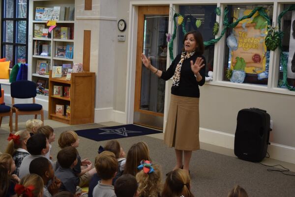 Children’s book author Carmen Agra Deedy tells a story recently to students at Stratford Academy in Macon. (Photo courtesy of Stratford Academy)